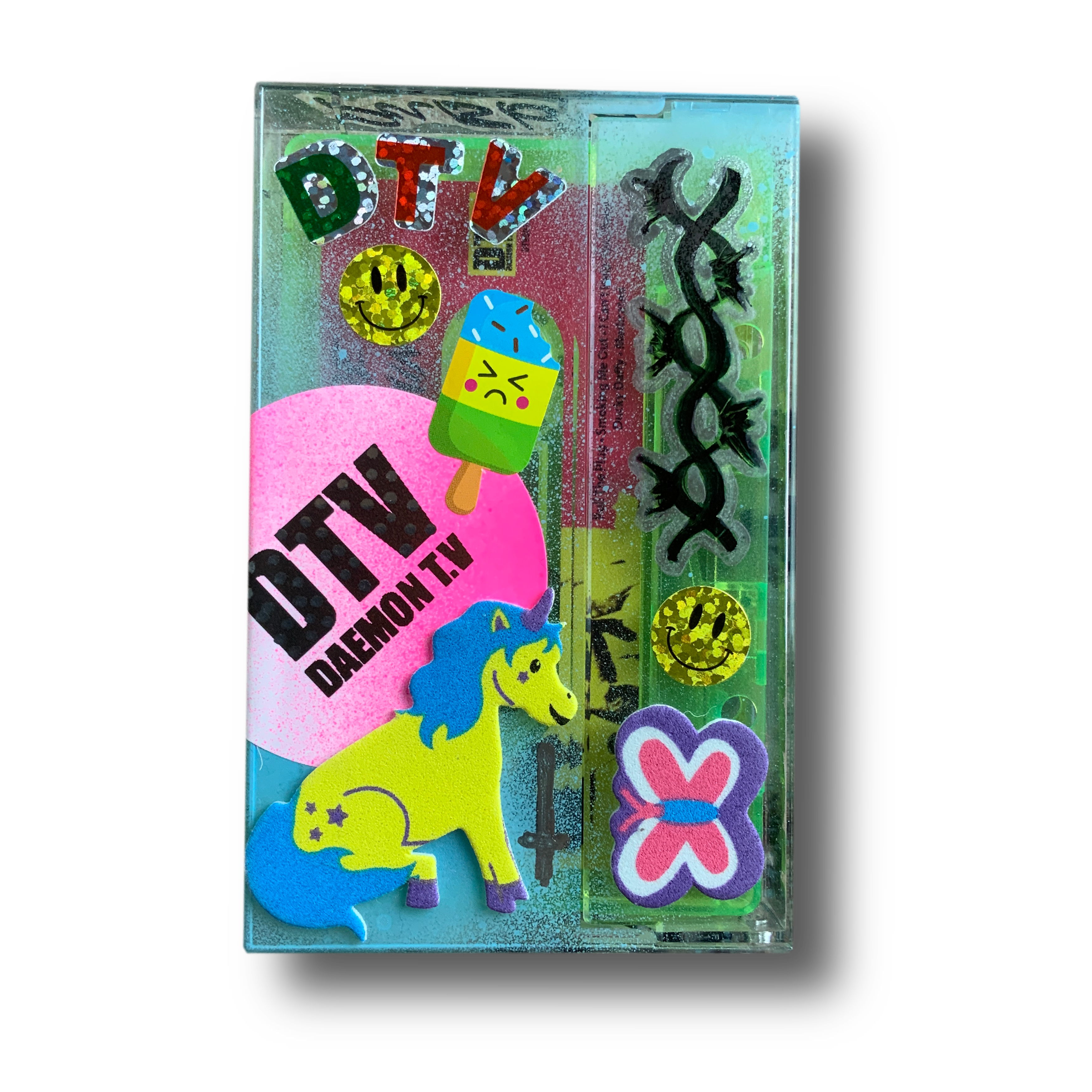 Hand decorated cassette tape with stickers and drawings